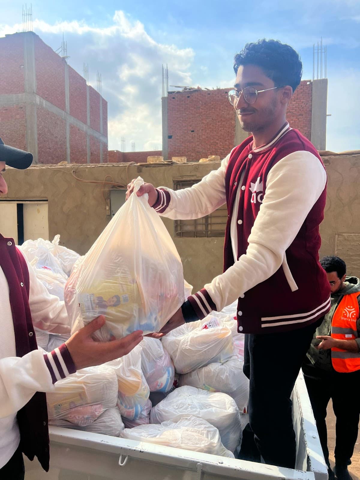 CIC students volunteering with share a smile in Ramadan Holy month